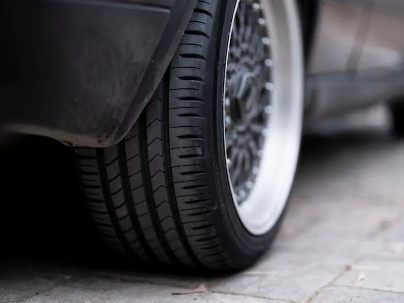 Close-up of a car wheel and tire