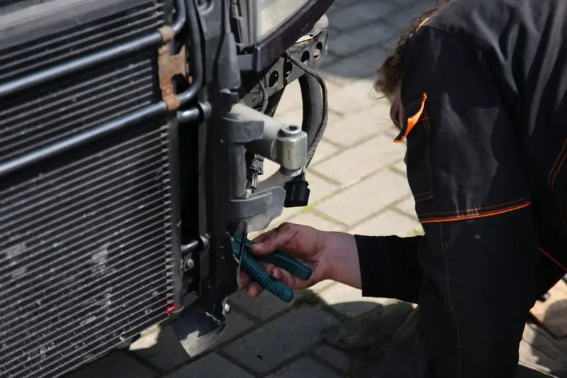Mechanic working on a car engine
